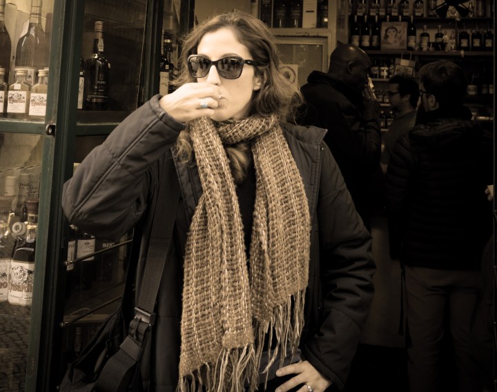 Here I am in front of a hole-in-the-wall but famous 'loja', sharing a Lisbon tradition among old, young, trendy Lisboetas and tourists who, like myself, discovered this  local concoction.